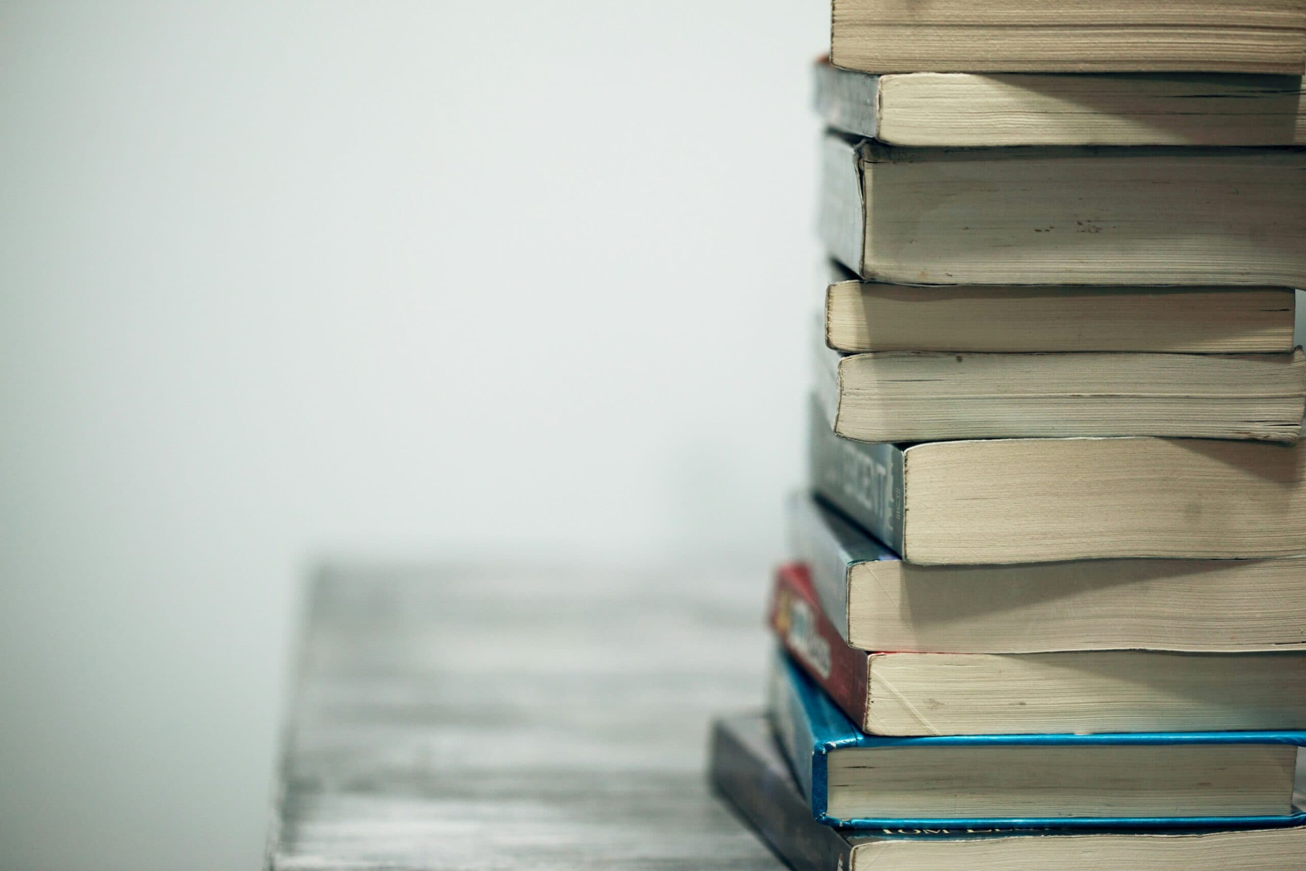 stack of biography books