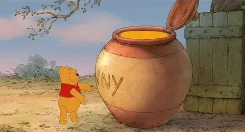 Winnie-the-Pooh hugging a big jar of honey to represent a honeypot for spam bots